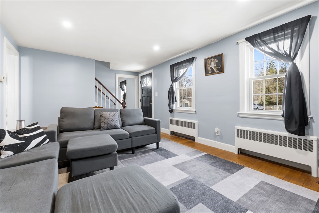 287 Main Street Saugus, MA 01906 - Photo 10 of 24 a living room with furniture and a window