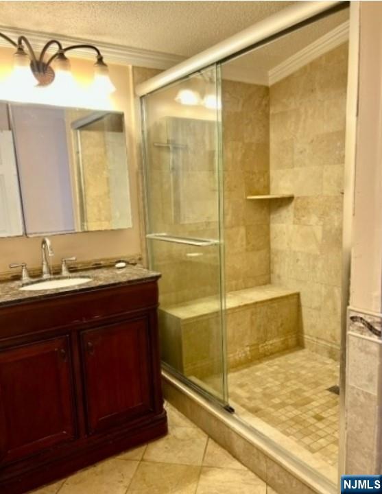 600 Pulis Mahwah, NJ 07430 - Photo 11 of 11 a bathroom with a granite countertop sink and a shower