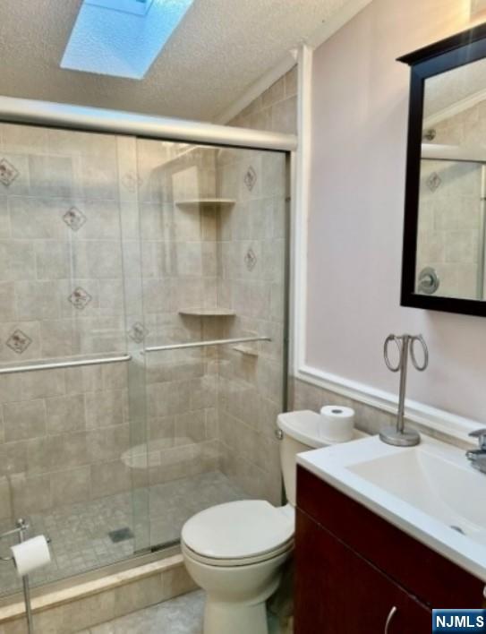 600 Pulis Mahwah, NJ 07430 - Photo 7 of 11 a bathroom with a sink and a mirror