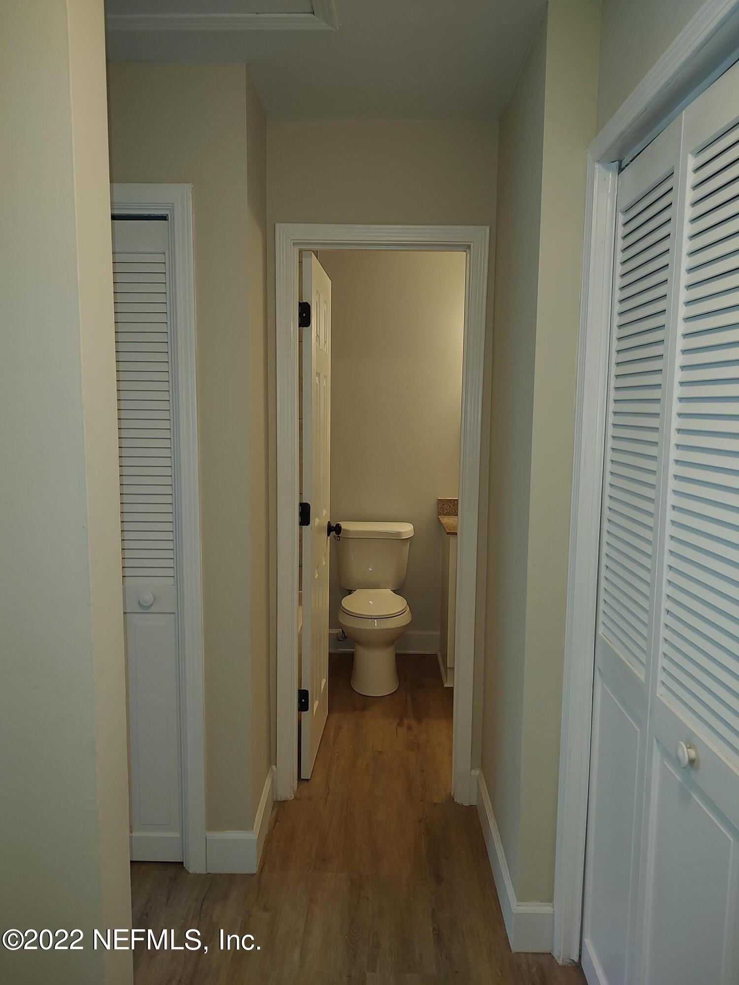 3517 Peeler Road, Unit 13 Jacksonville, FL 32277 - Photo 18 of 31 a view of a bathroom with a toilet