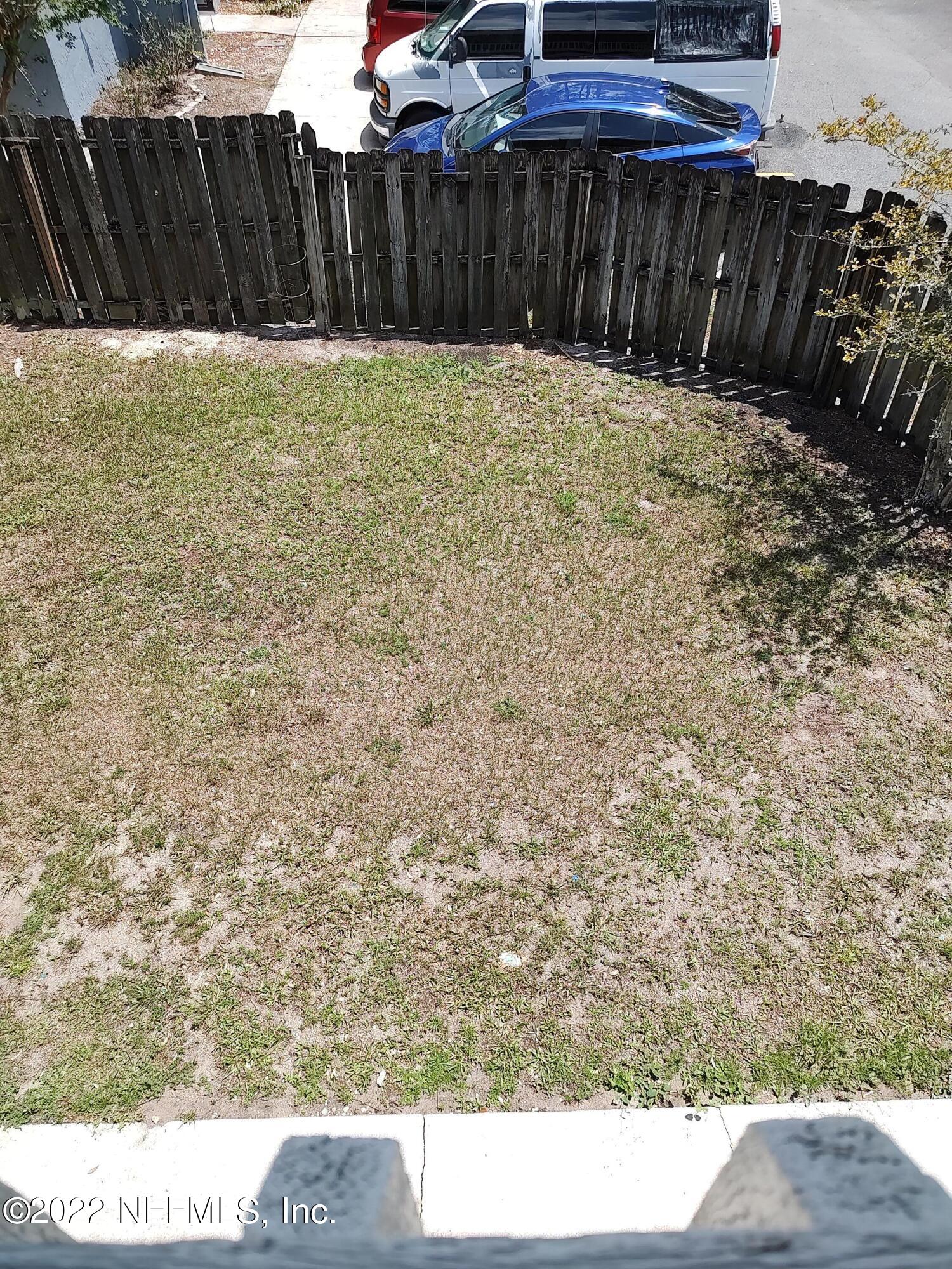 3517 Peeler Road, Unit 13 Jacksonville, FL 32277 - Photo 23 of 31 a view of wooden fence
