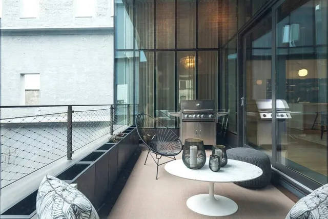 a building outdoor space with patio furniture