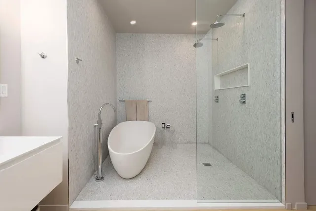 a view of a bathroom with a bathtub