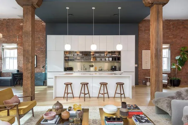 a view of a livingroom with furniture and a couch