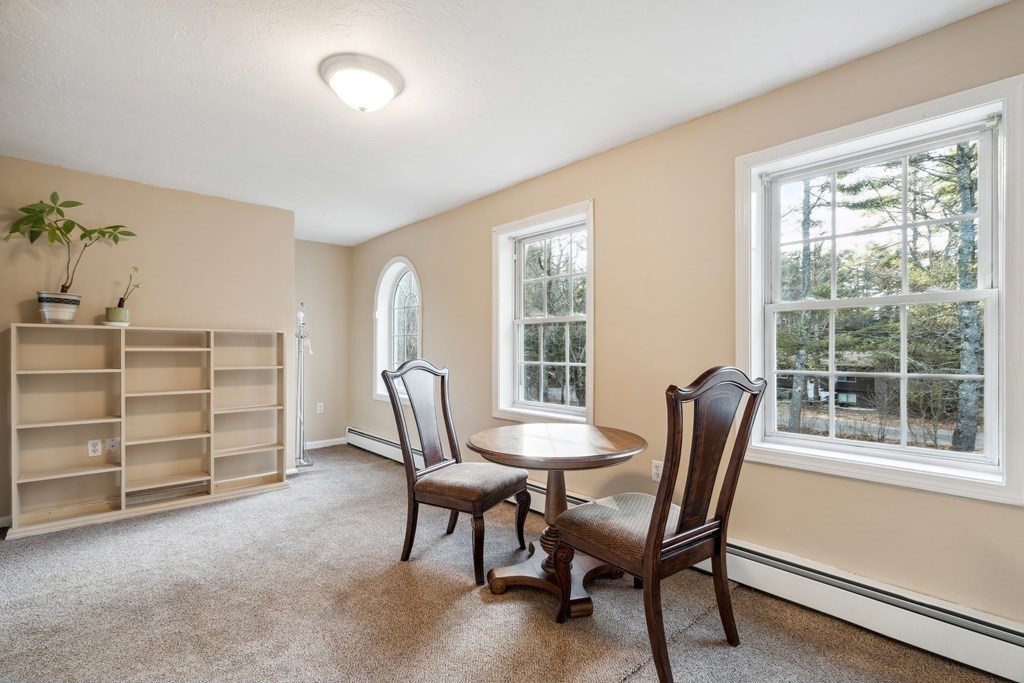 33 Sibley Road Winchendon, MA 01475 - Photo 11 of 17 a view of a workspace with furniture and a window