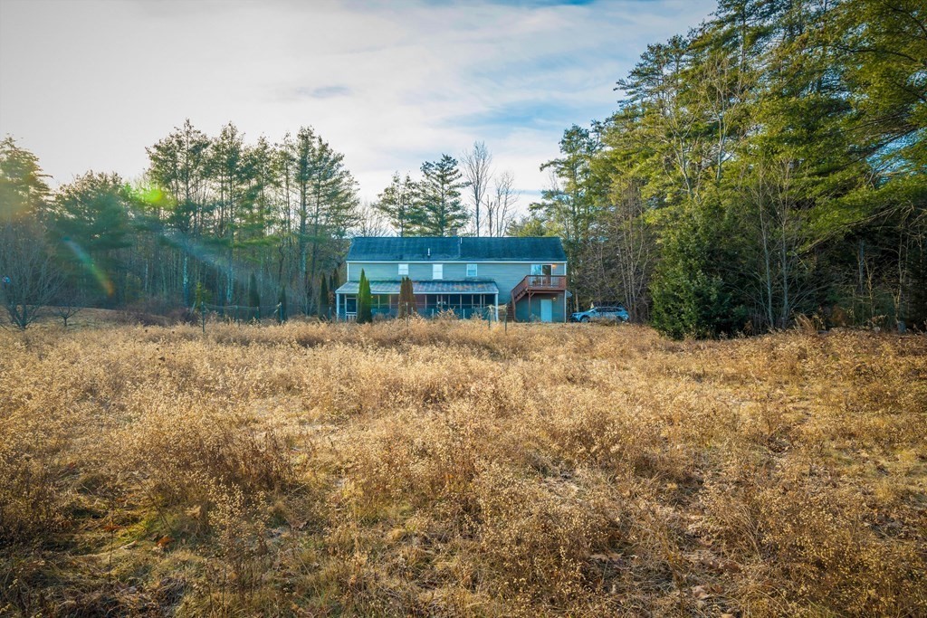 33 Sibley Road Winchendon, MA 01475 - Photo 4 of 17 a view of backyard with wooden fence