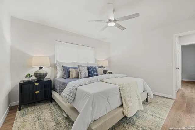 a bed room with bed and window