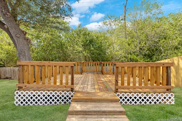 a view of a wooden fence