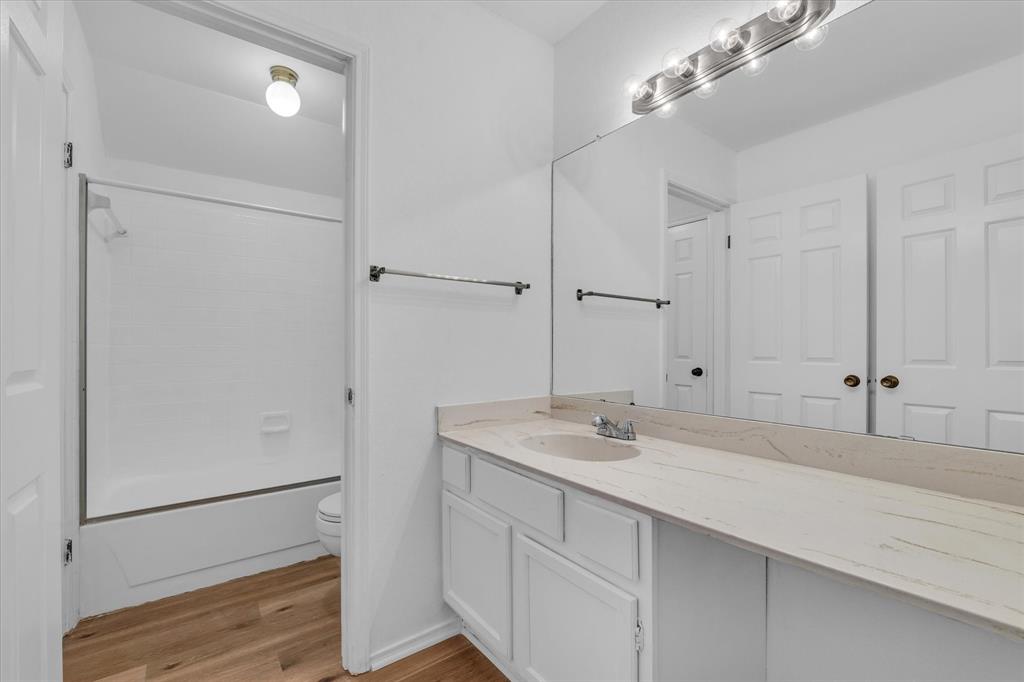 1300 Chapel Downs Waco, TX 76712 - Photo 21 of 38 a bathroom with a sink and a mirror