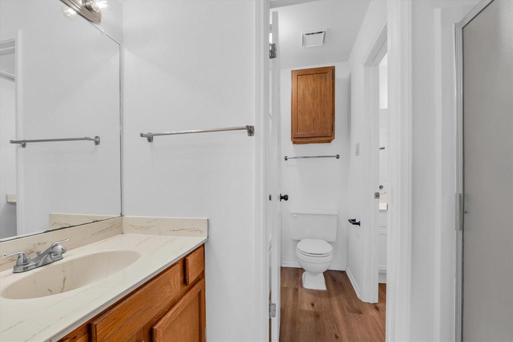 1300 Chapel Downs Waco, TX 76712 - Photo 22 of 38 a bathroom with a sink and a mirror