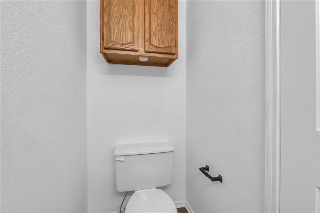 1300 Chapel Downs Waco, TX 76712 - Photo 26 of 38 a white toilet sitting next to a shower