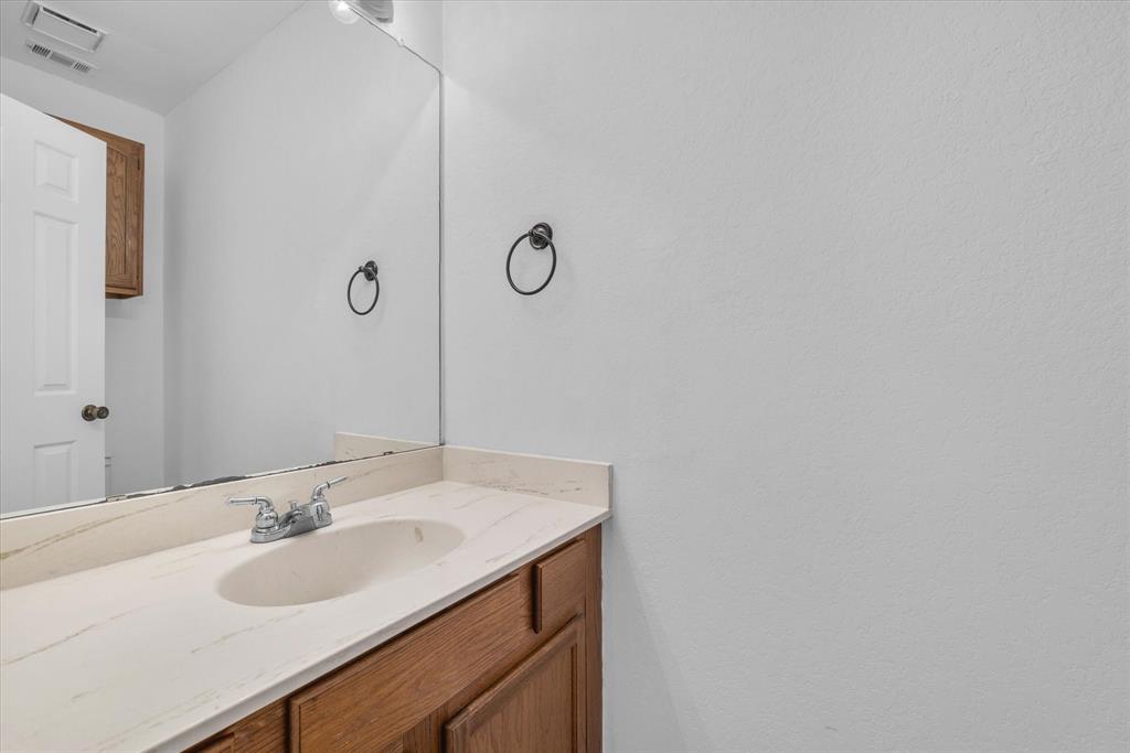 1300 Chapel Downs Waco, TX 76712 - Photo 27 of 38 a bathroom with a sink and a mirror