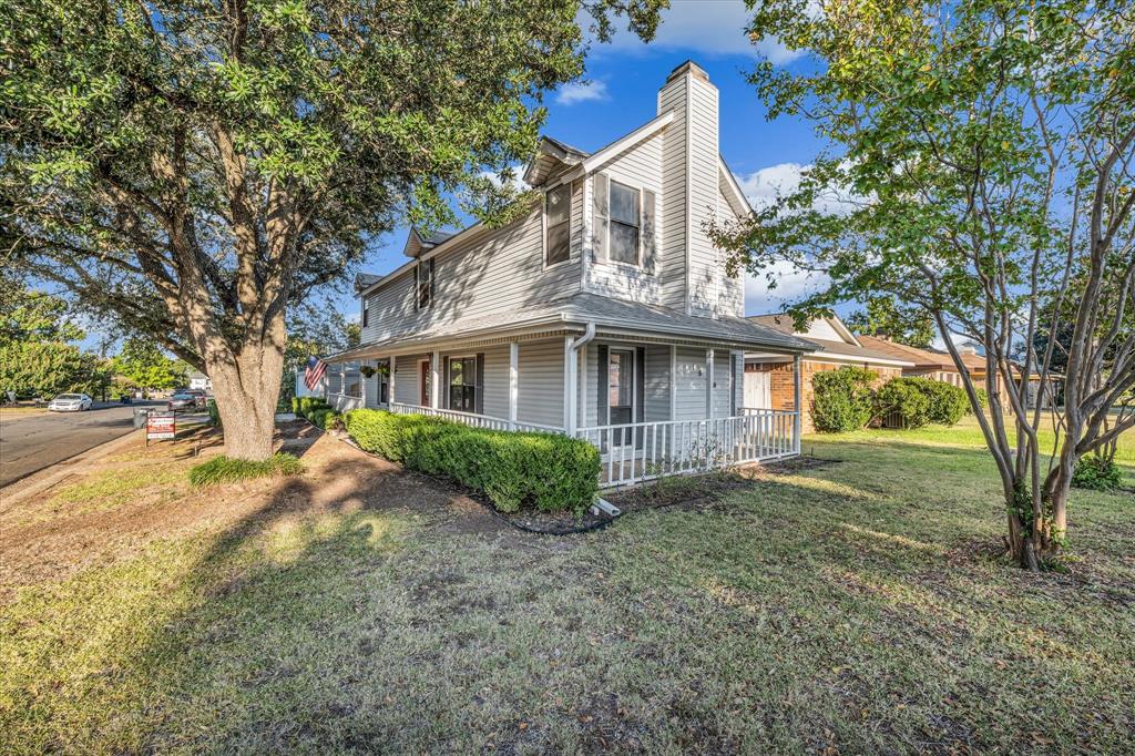 1300 Chapel Downs Waco, TX 76712 - Photo 3 of 38 a view of a yard in front of a house