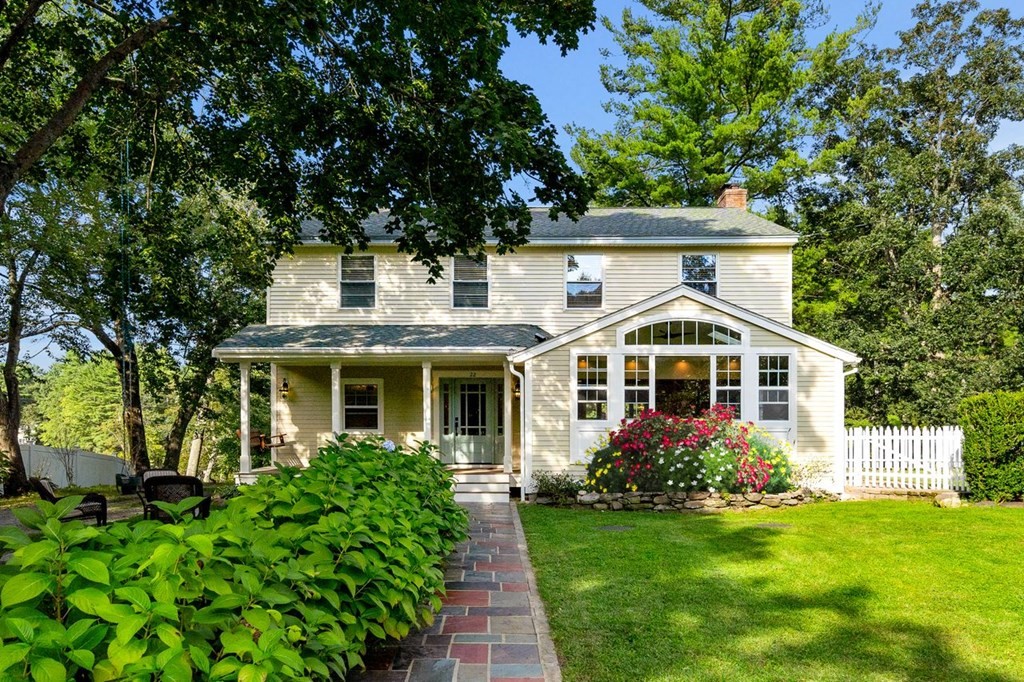 22 Fosters Pond Road Andover, MA 01810 - Photo 2 of 42 a front view of a house with a yard