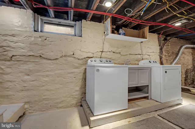 a utility room with cabinets