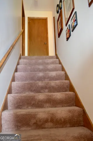 a view of a hallway with a furniture