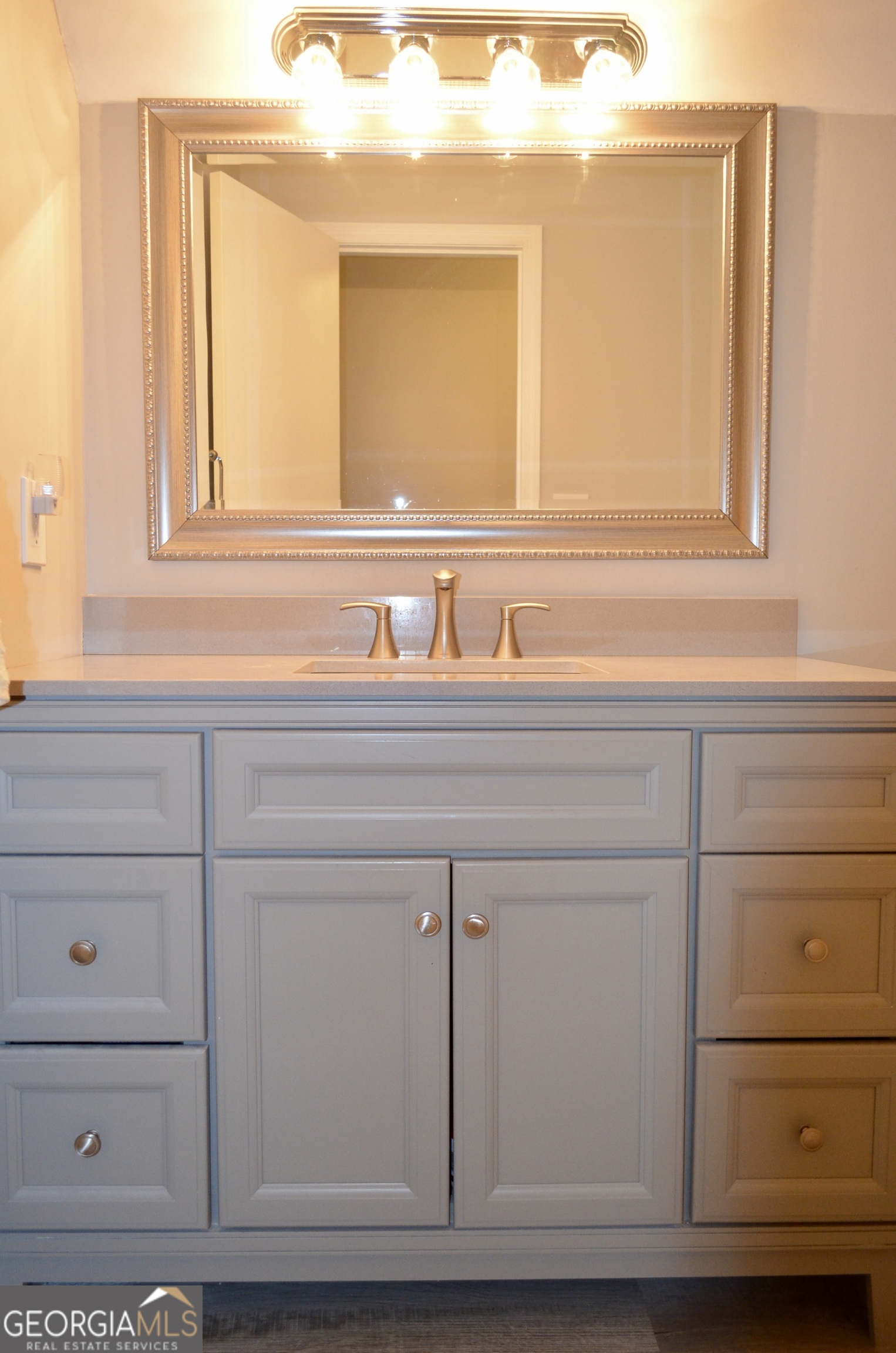116 Elk Run Warner Robins, GA 31088 - Photo 15 of 43 a bathroom with a sink and a mirror