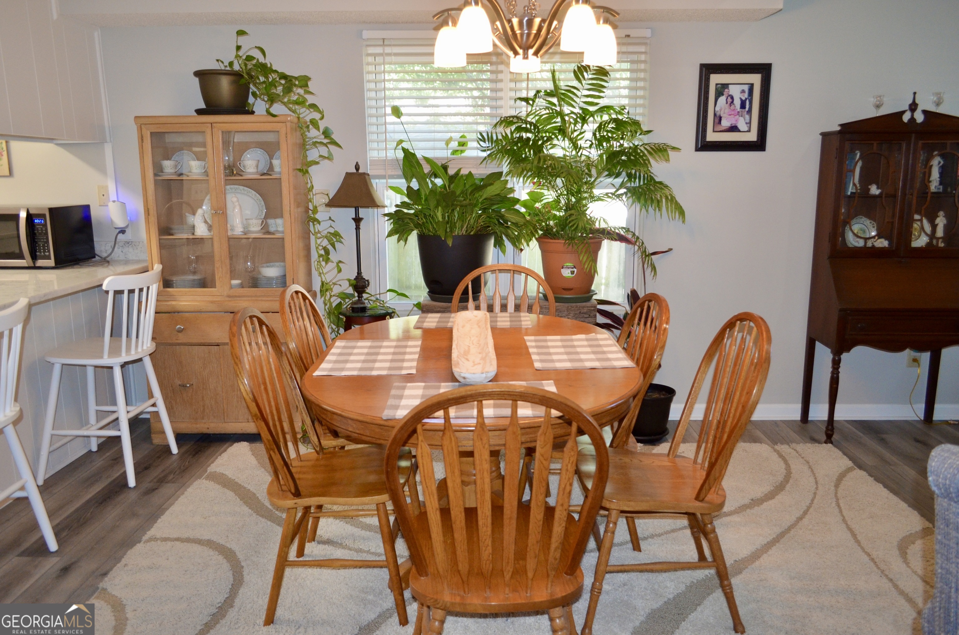 116 Elk Run Warner Robins, GA 31088 - Photo 26 of 43 a view of a dining room with furniture window and wooden floor