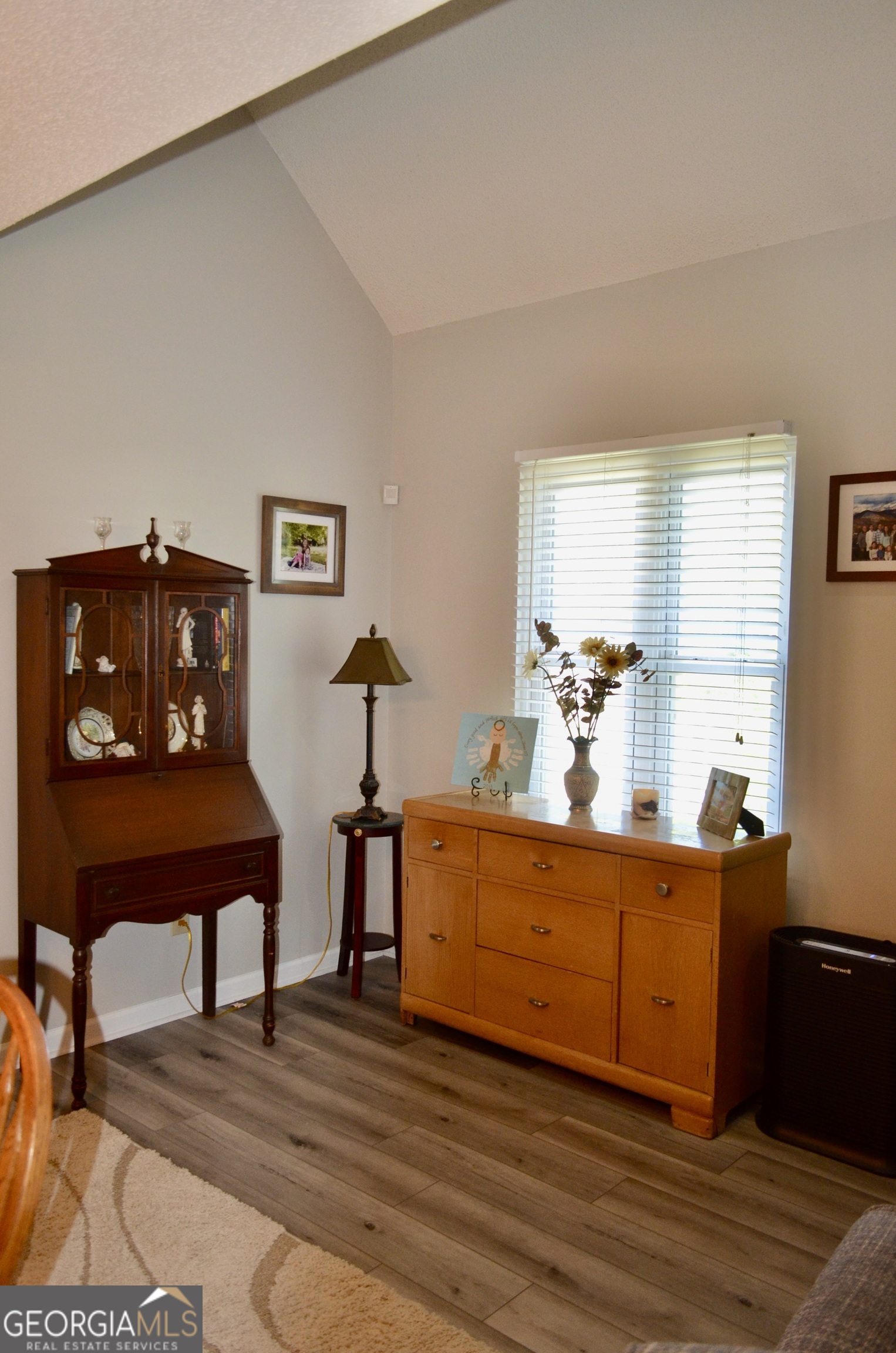 116 Elk Run Warner Robins, GA 31088 - Photo 27 of 43 a living room with furniture and a wooden floor
