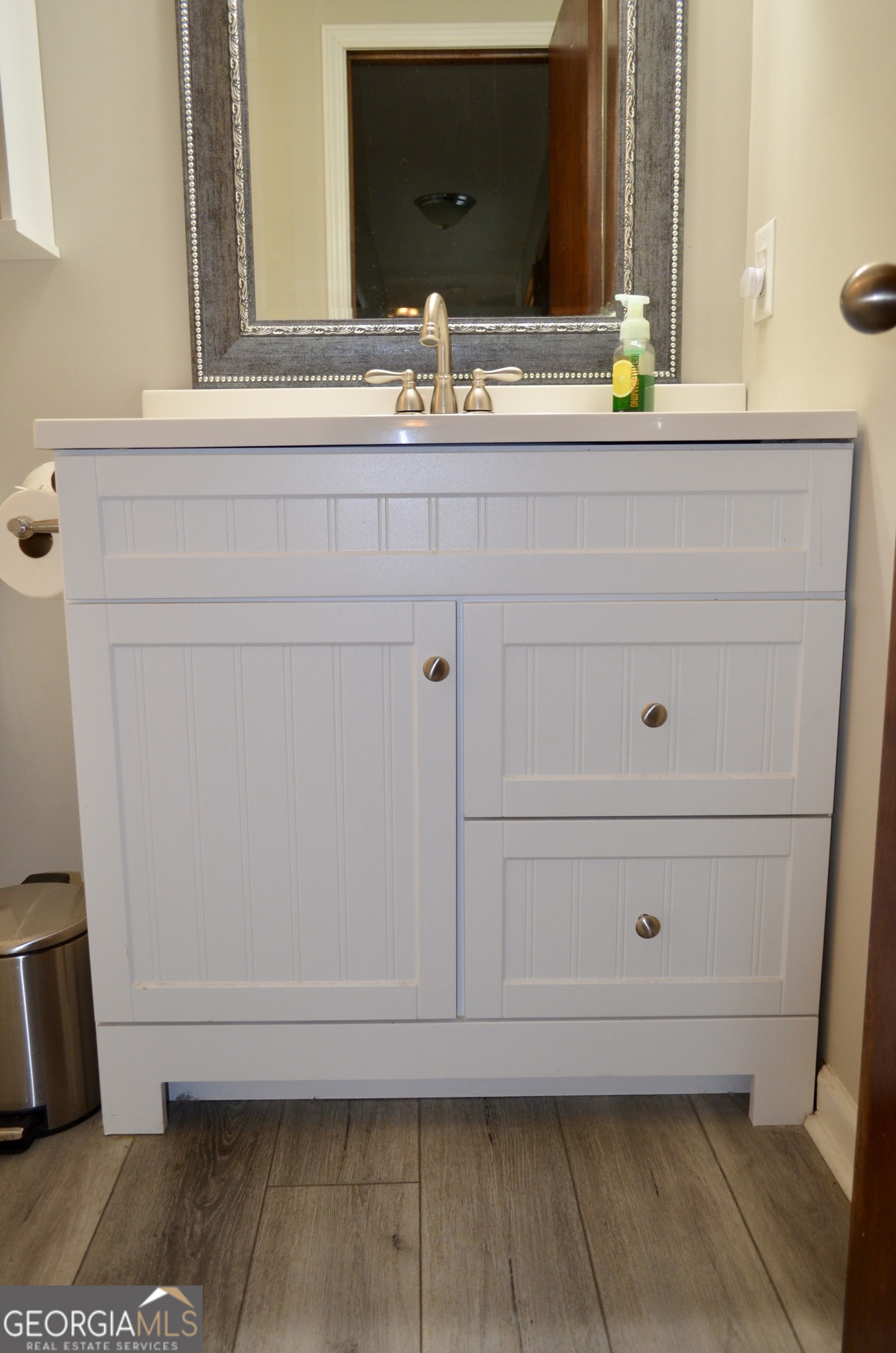 116 Elk Run Warner Robins, GA 31088 - Photo 31 of 43 a bathroom with a sink and a mirror