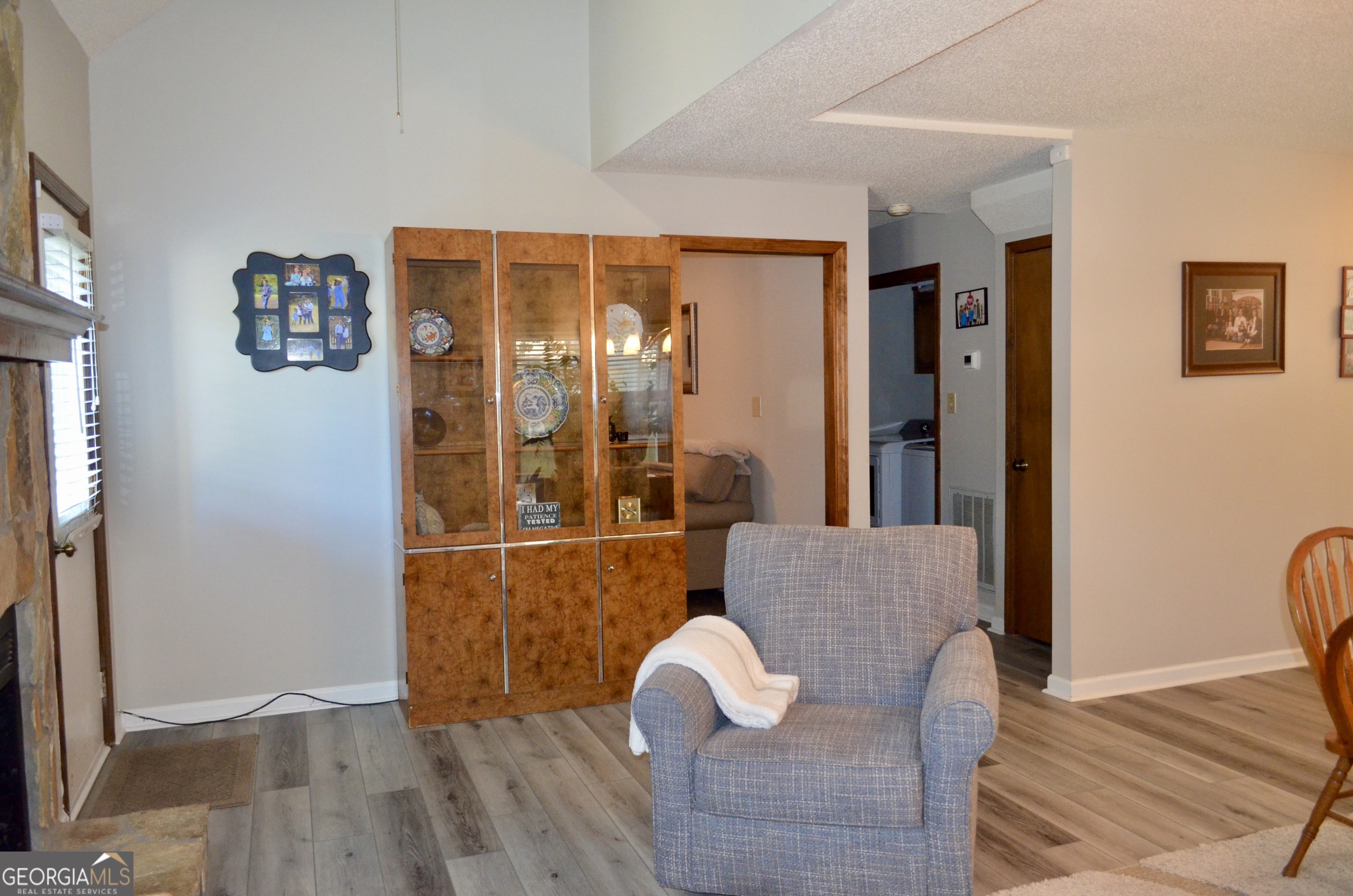 116 Elk Run Warner Robins, GA 31088 - Photo 7 of 43 a living room with furniture and wooden floor
