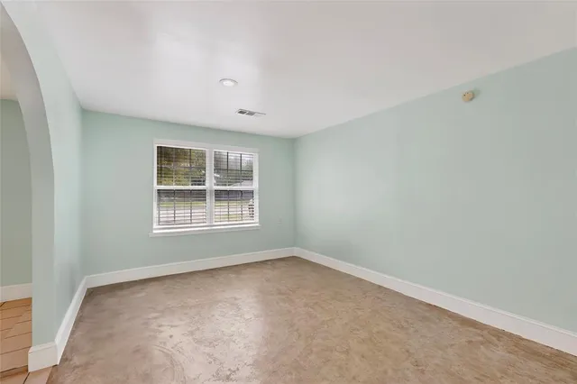 a kitchen with stainless steel appliances granite countertop a sink and a stove top oven