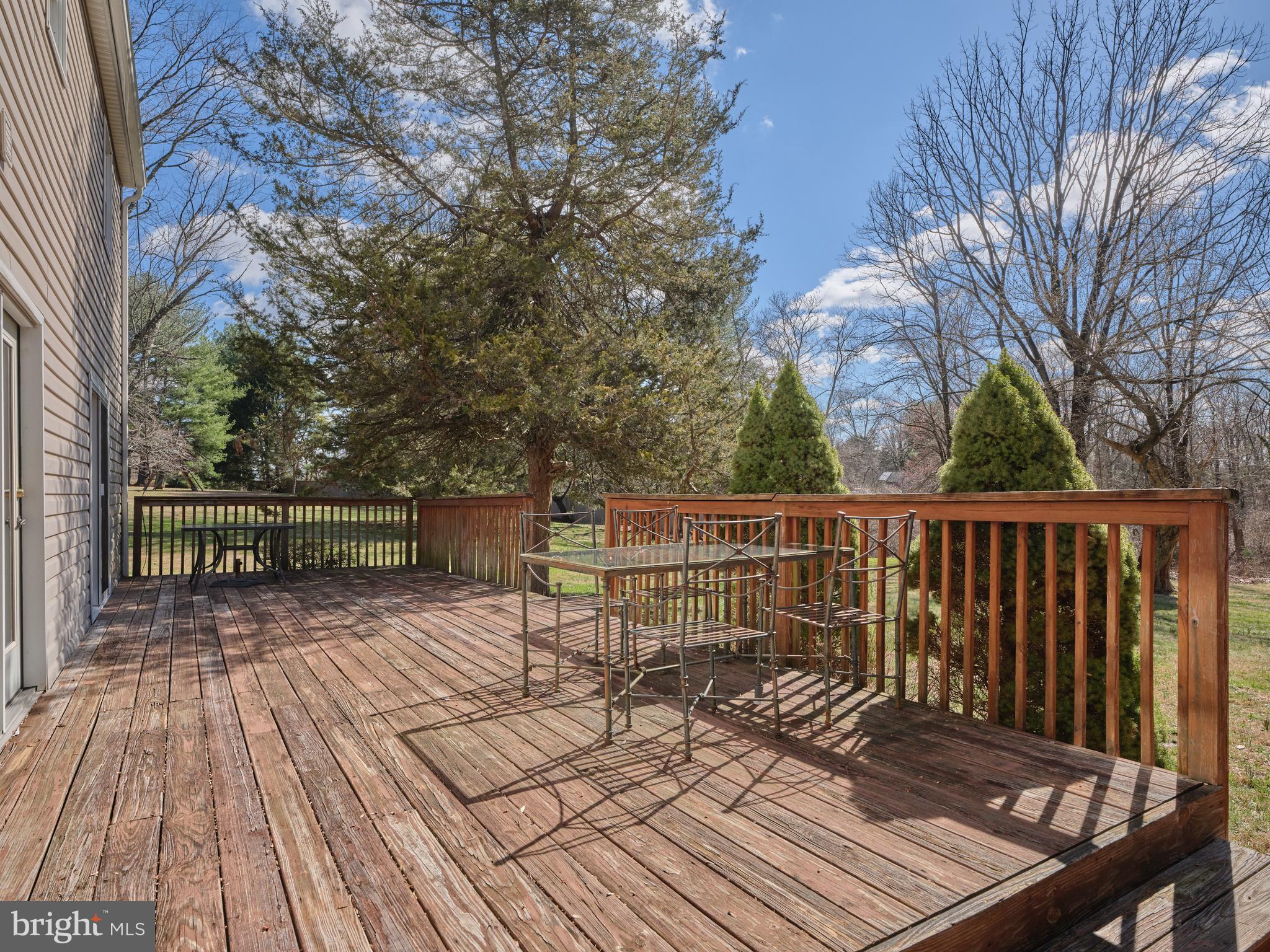 6724 Upper York Road New Hope, PA 18938 - Photo 33 of 40 a view of balcony with wooden floor and outdoor seating