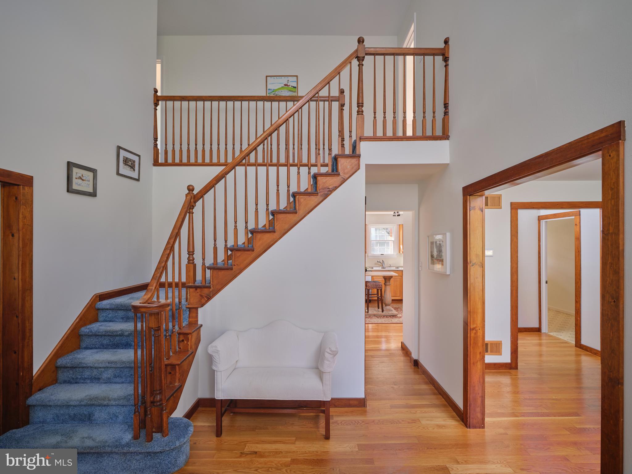 6724 Upper York Road New Hope, PA 18938 - Photo 4 of 40 a view of staircase with wooden floor and a front door