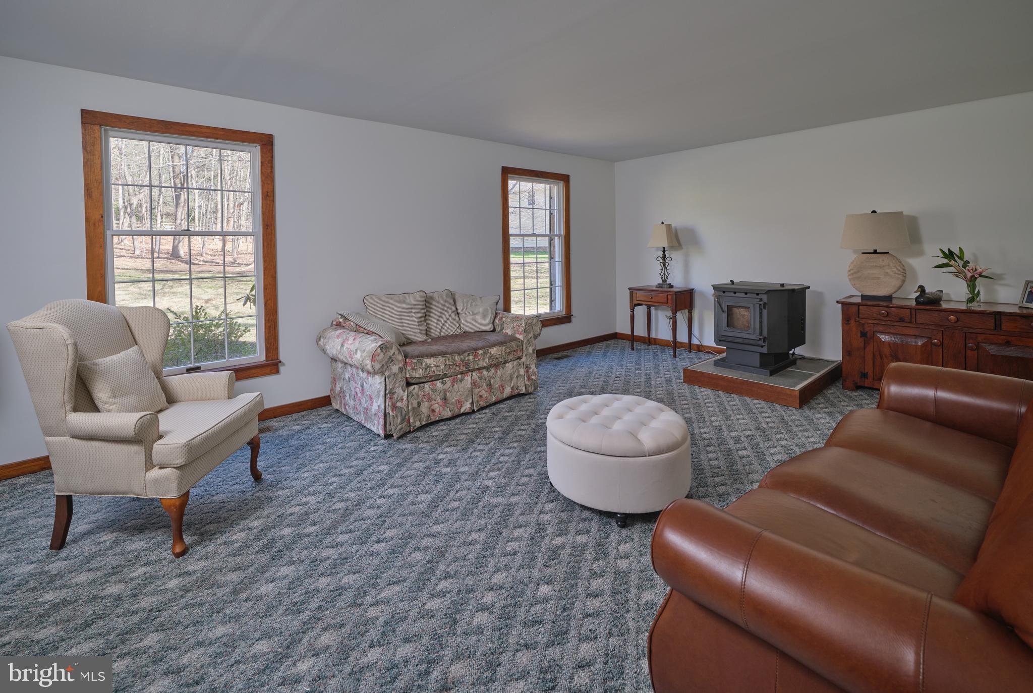 6724 Upper York Road New Hope, PA 18938 - Photo 5 of 40 a living room with furniture and a large window