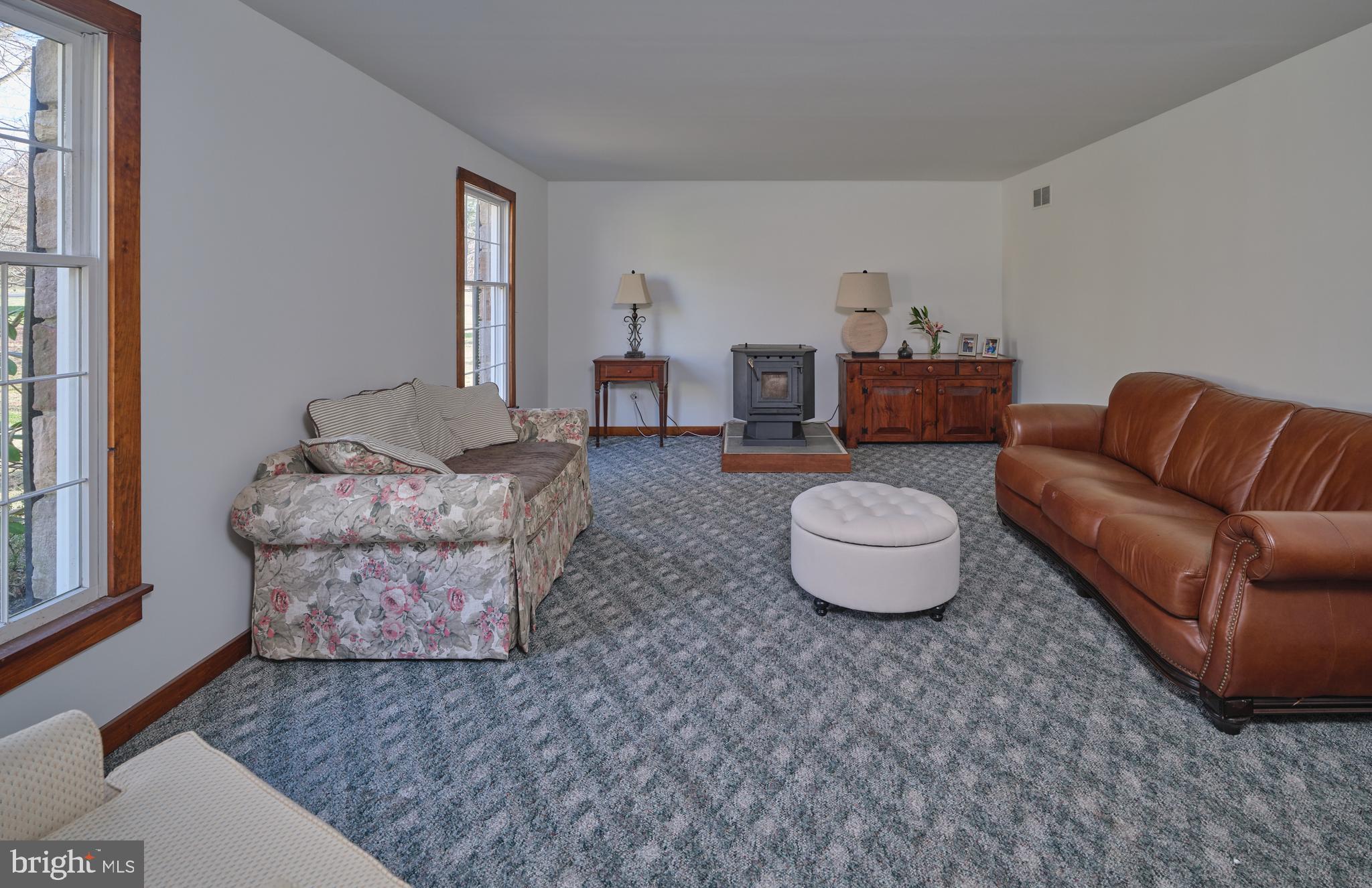 6724 Upper York Road New Hope, PA 18938 - Photo 6 of 40 a living room with furniture and a rug
