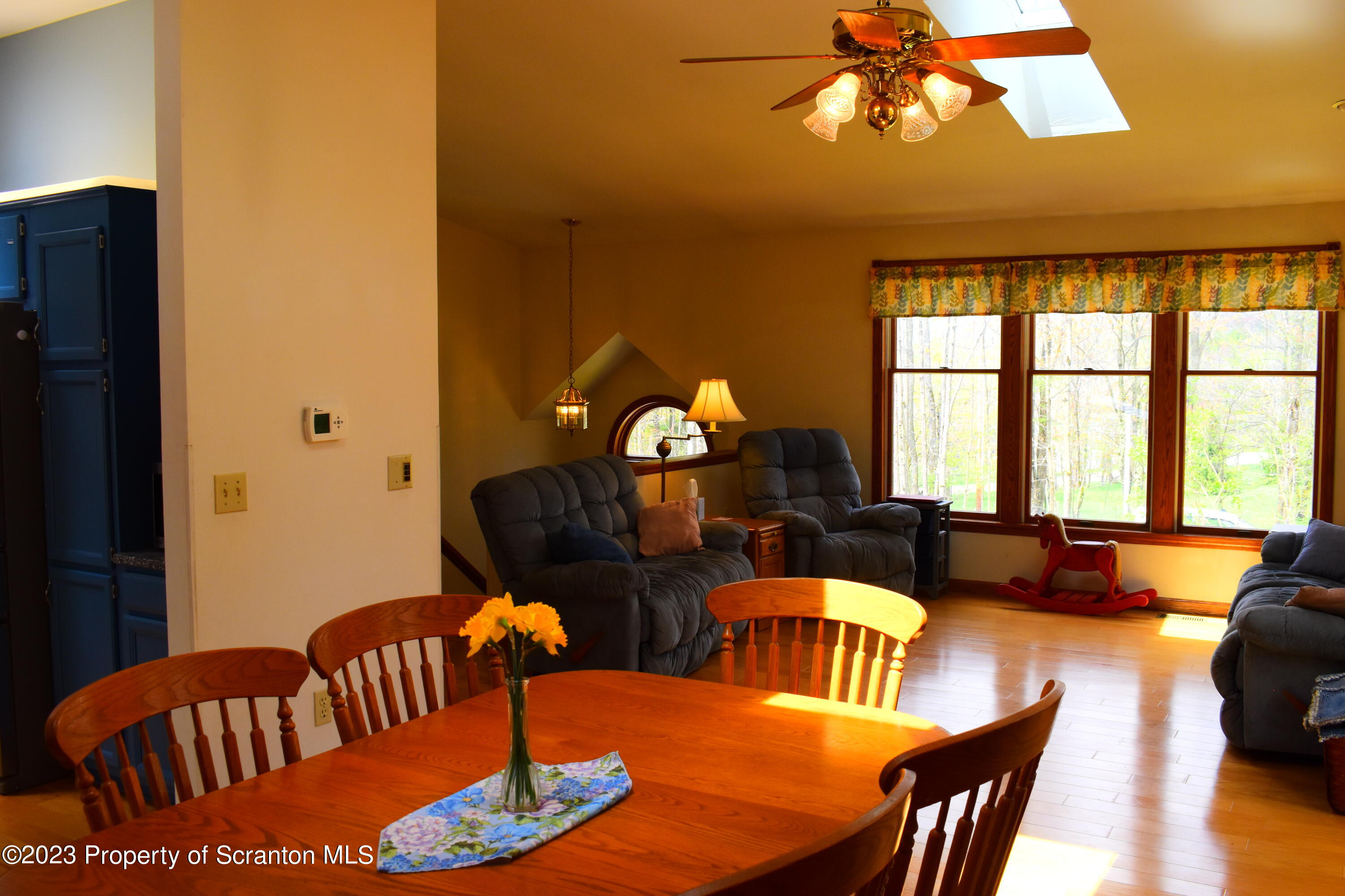 510 Hawranick Road Brackney, PA 18812 - Photo 14 of 76 a living room with furniture and a chandelier