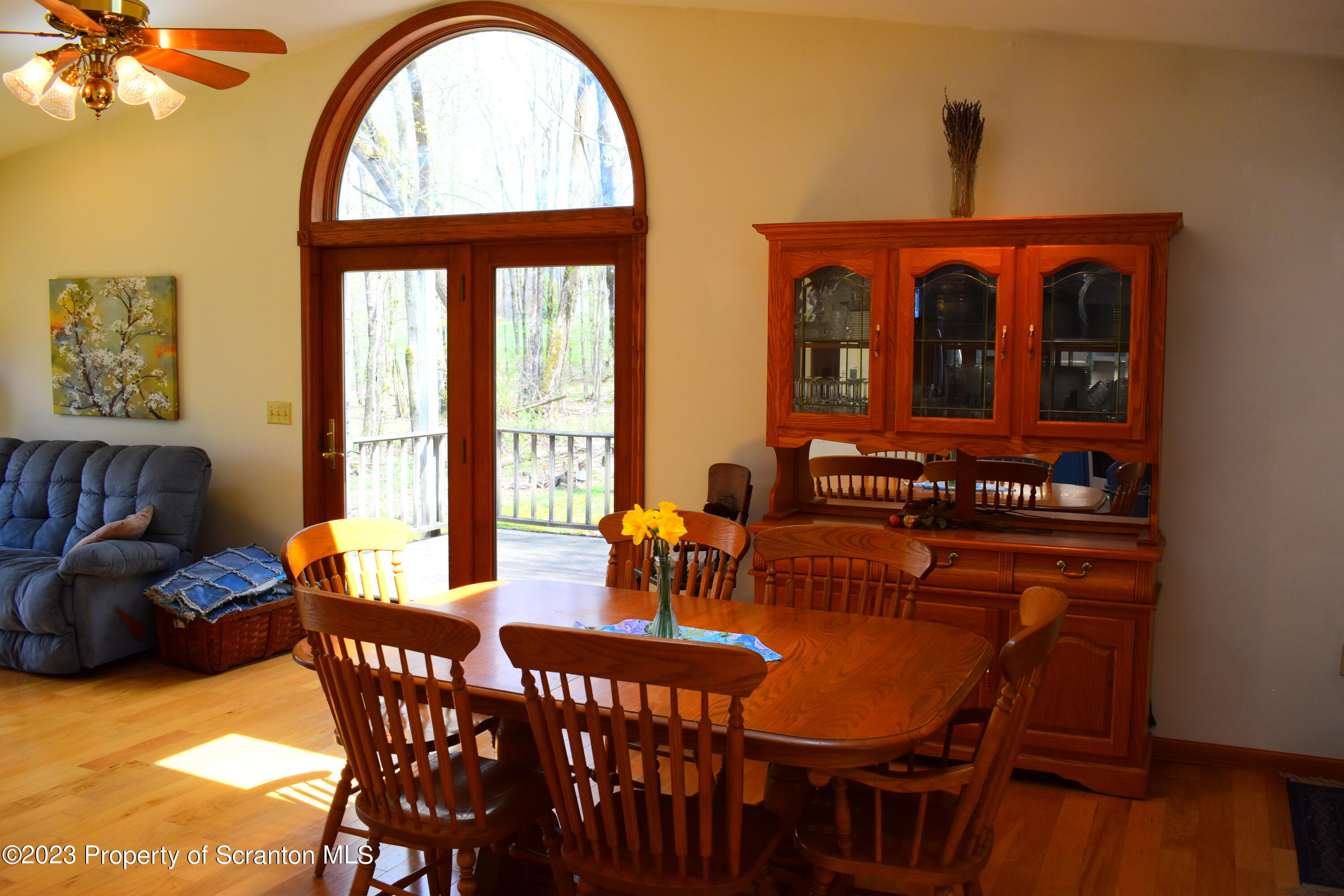 510 Hawranick Road Brackney, PA 18812 - Photo 15 of 76 a view of a dining room with furniture window and wooden floor