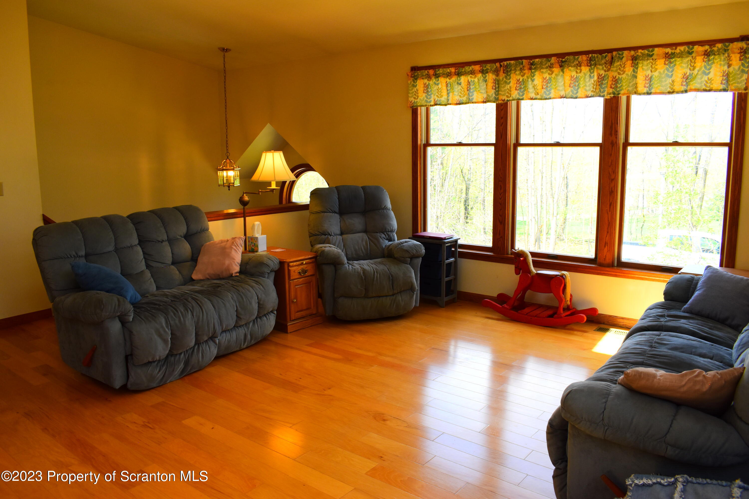 510 Hawranick Road Brackney, PA 18812 - Photo 18 of 76 a living room with furniture and a large window