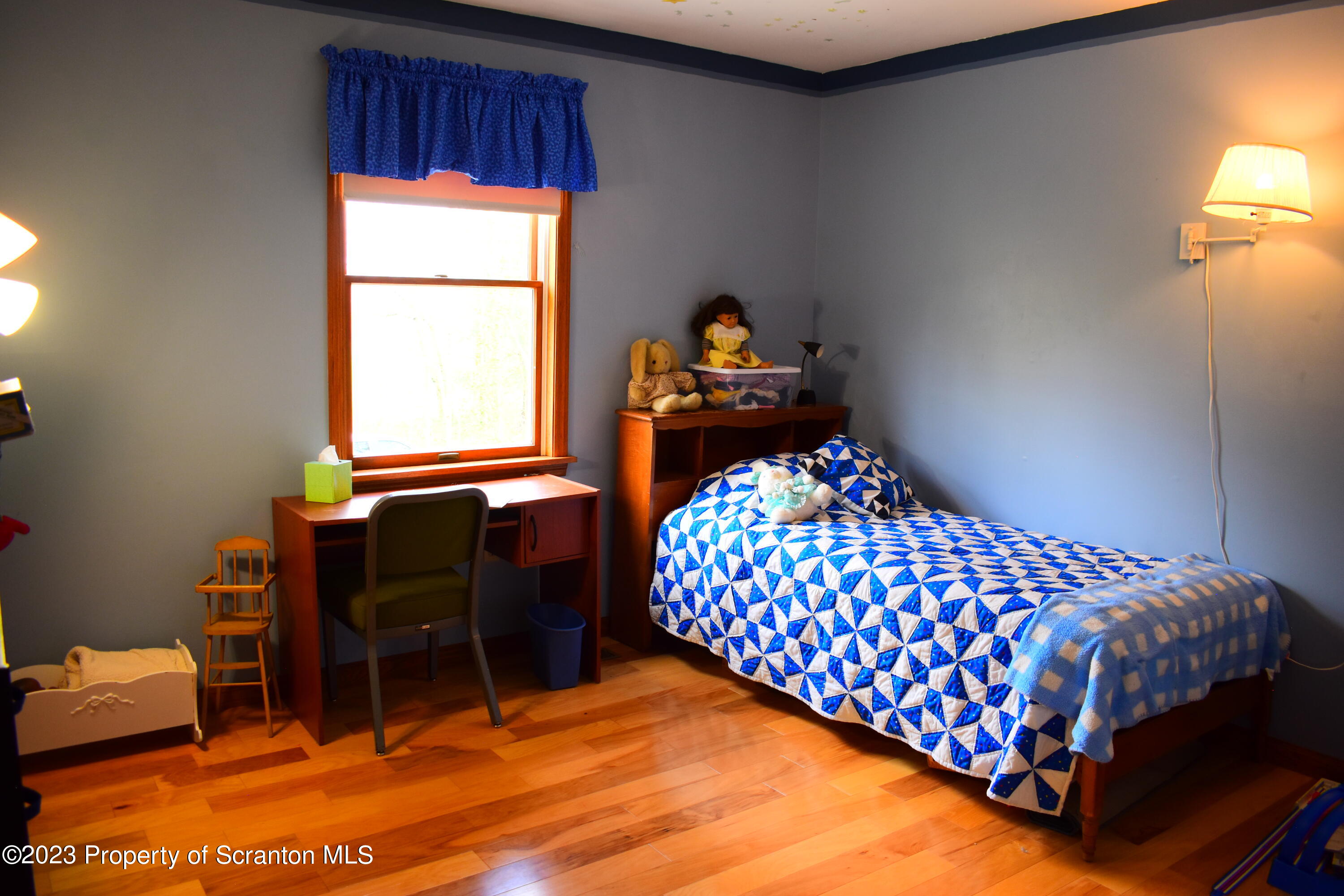 510 Hawranick Road Brackney, PA 18812 - Photo 22 of 76 a bedroom with a bed and a window