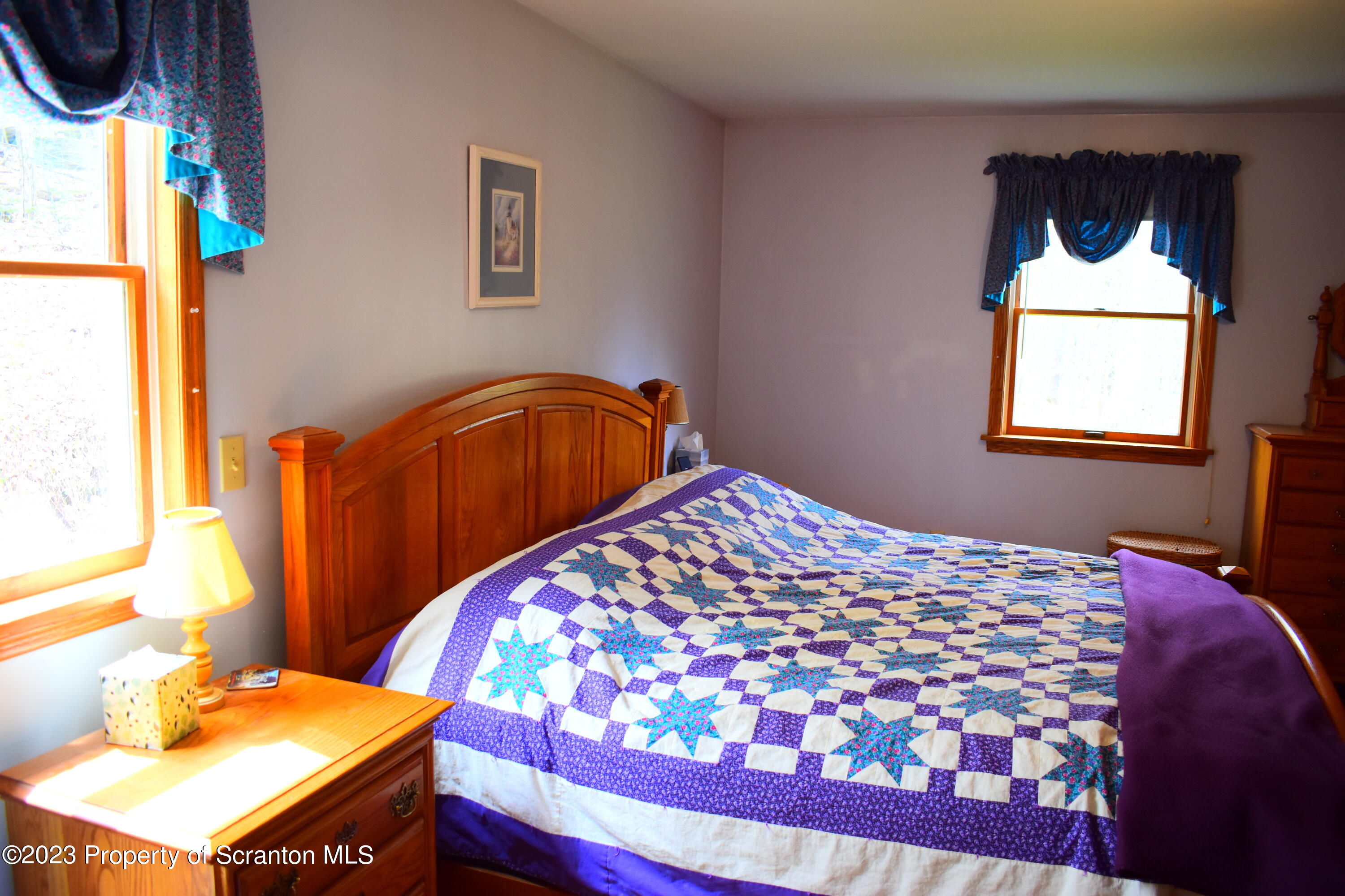 510 Hawranick Road Brackney, PA 18812 - Photo 25 of 76 a bedroom with a bed and dresser
