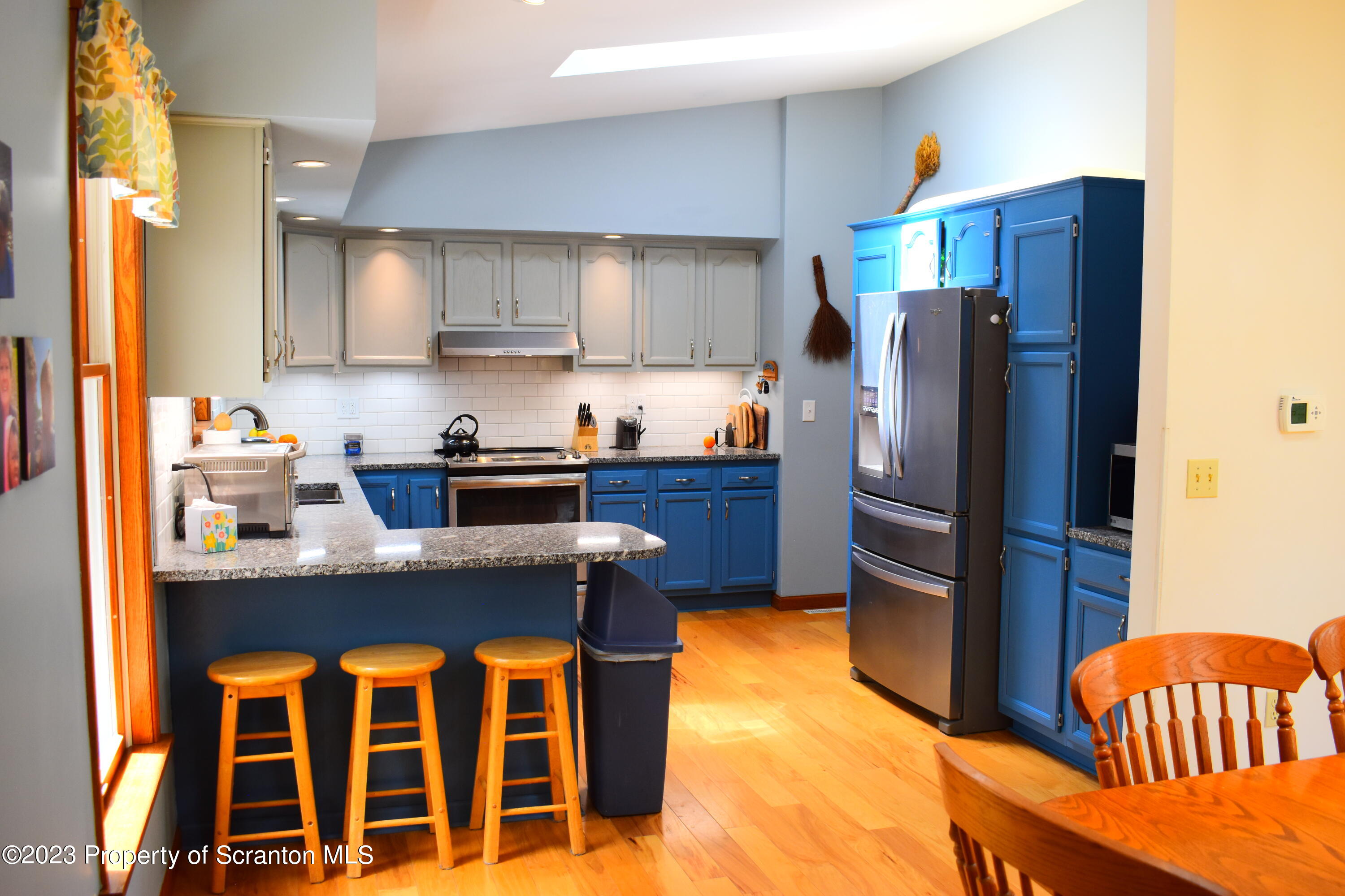 510 Hawranick Road Brackney, PA 18812 - Photo 5 of 76 a kitchen with stainless steel appliances granite countertop a refrigerator and a stove top oven