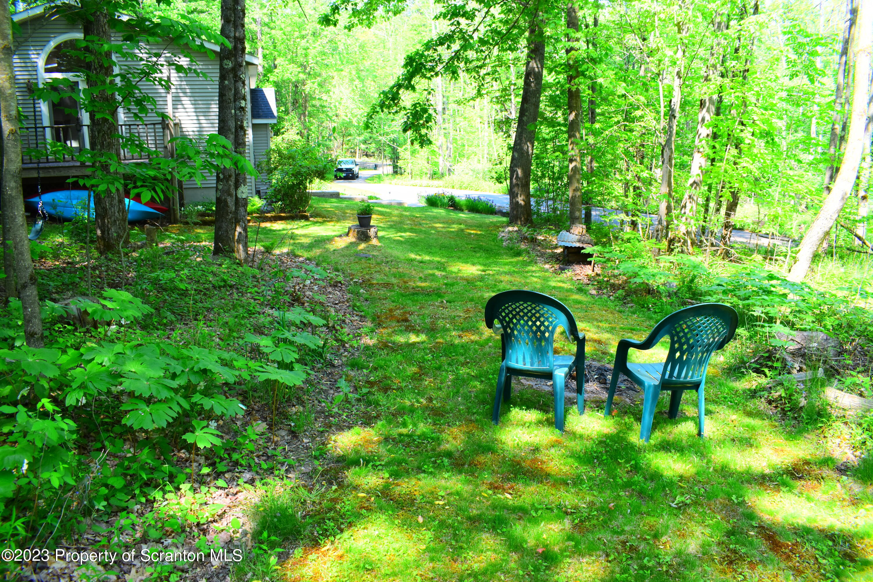 510 Hawranick Road Brackney, PA 18812 - Photo 56 of 76 a view of yard with green space and seating area