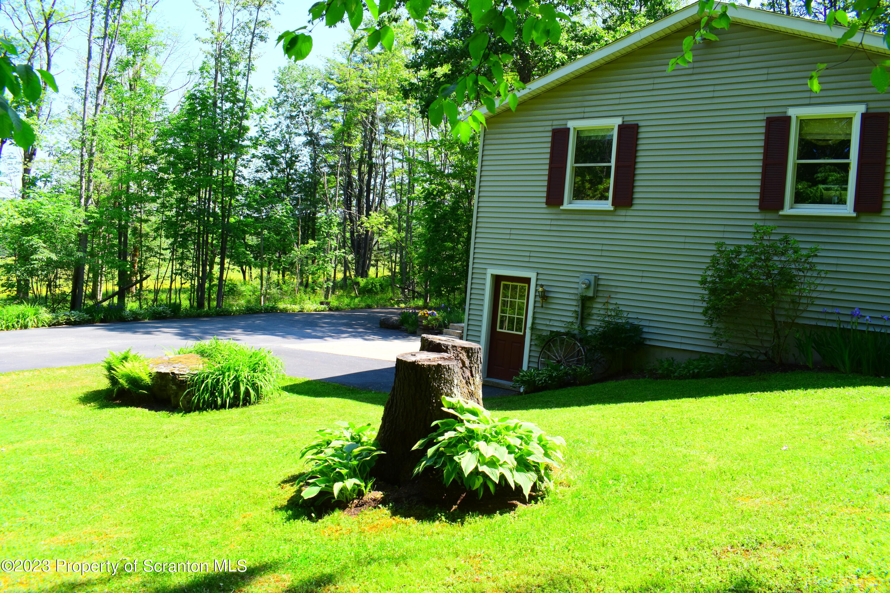 510 Hawranick Road Brackney, PA 18812 - Photo 70 of 76 a backyard of a house with lots of green space