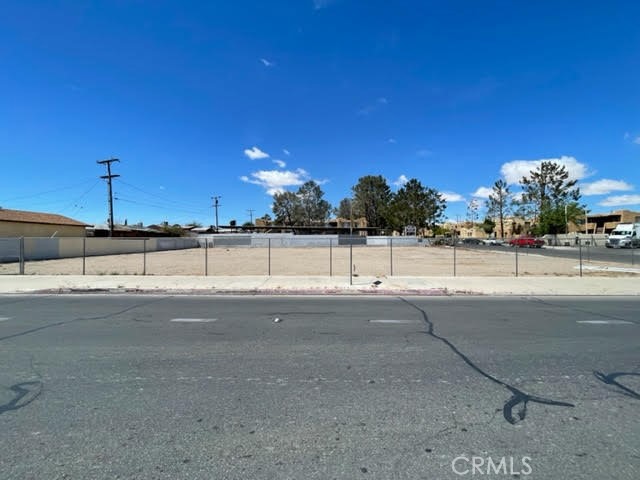 200 Montara Road Barstow, CA 92311 - Photo 14 of 31 a view of a road with a yard