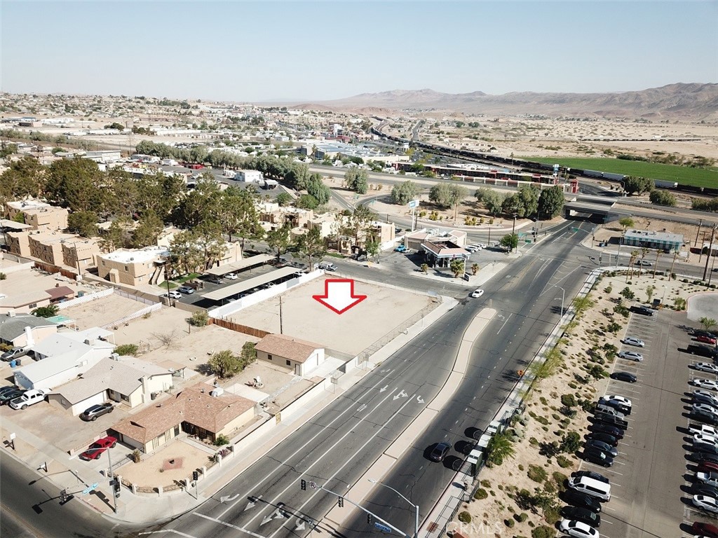 200 Montara Road Barstow, CA 92311 - Photo 2 of 31 an aerial view of residential houses with outdoor space