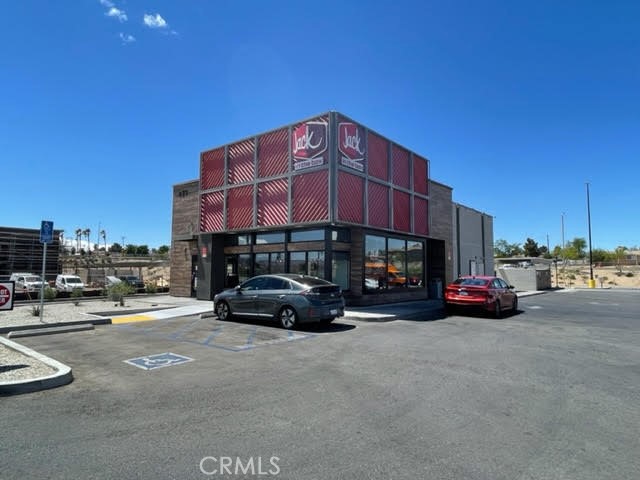 200 Montara Road Barstow, CA 92311 - Photo 22 of 31 a car parked in front of a building