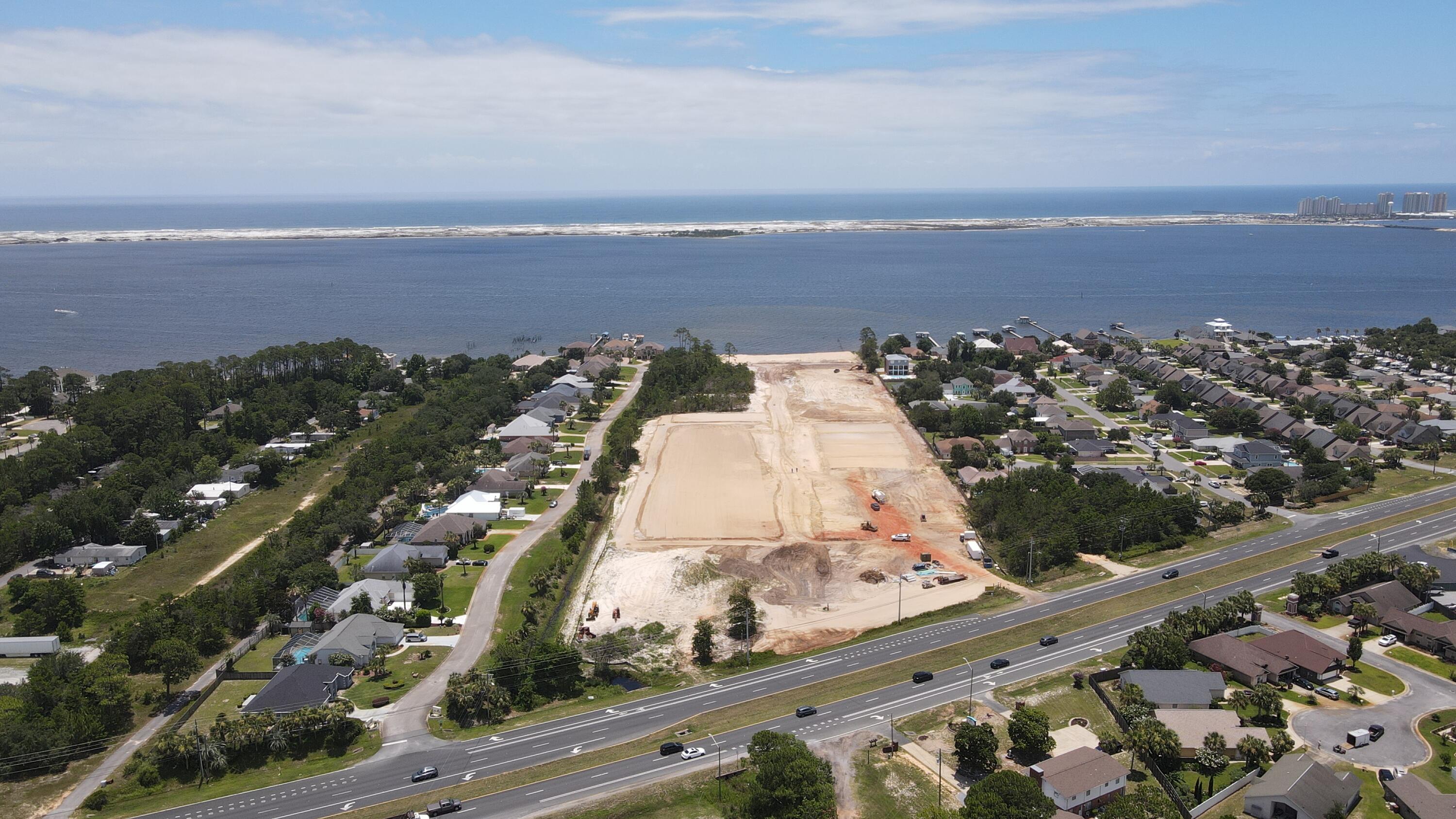13 A Wild Heron Drive Navarre, FL 32566 - Photo 2 of 3 an aerial view of a city