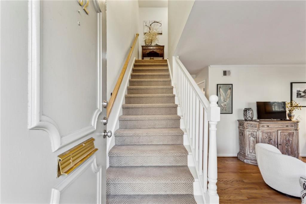162 Lablanc Way Northwest Atlanta, GA 30327 - Photo 3 of 22 a view of entryway and hall with wooden floor