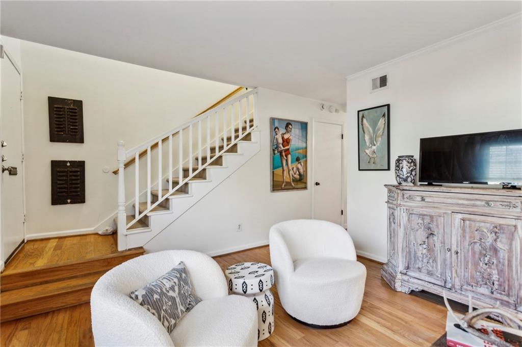 162 Lablanc Way Northwest Atlanta, GA 30327 - Photo 6 of 22 a living room with furniture and a flat screen tv