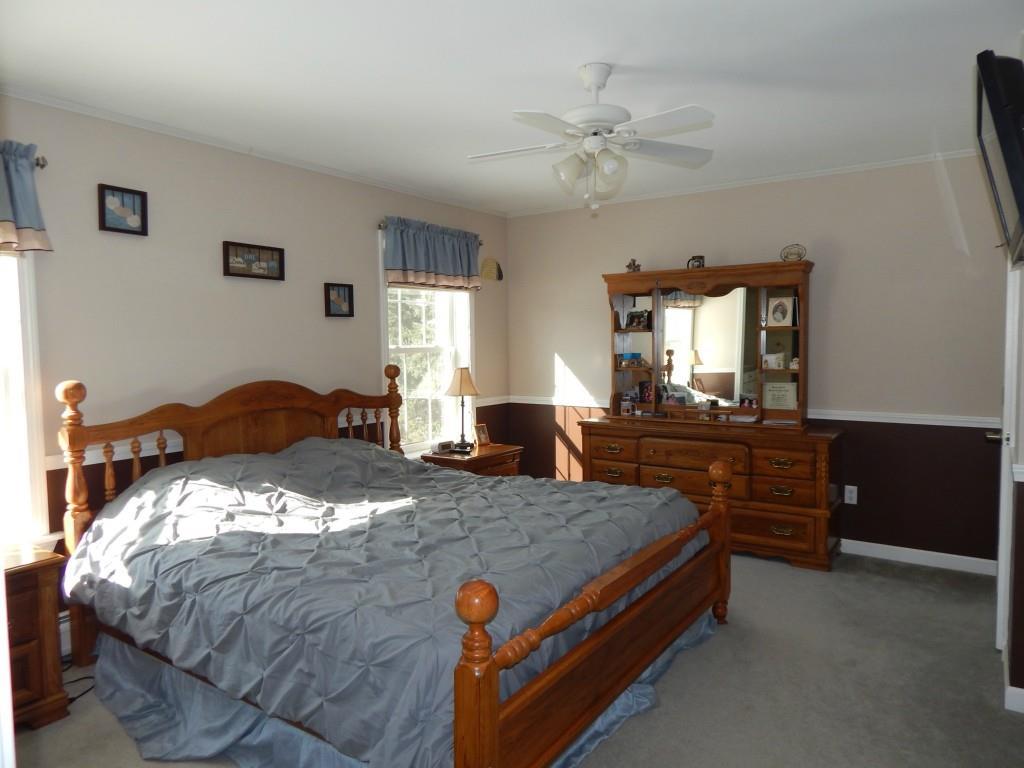 511 Wing Road Hermon, ME 04401 - Photo 18 of 34 Master bedroom with bathroom and...