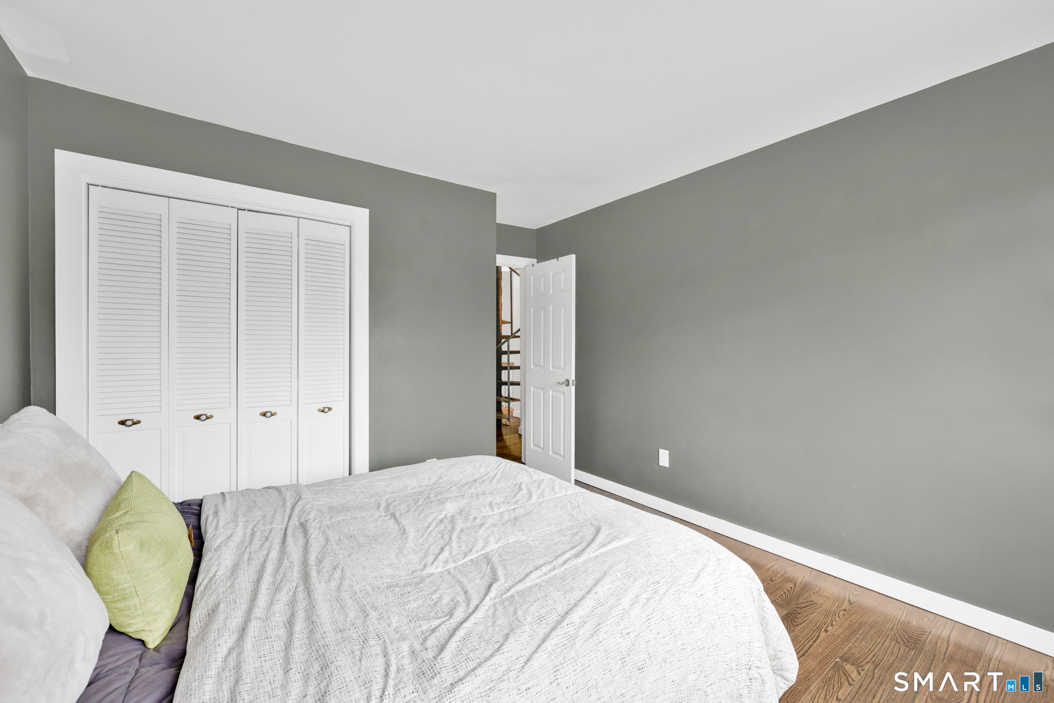 8 Whirling Dun, Unit 8 Canton, CT 06019 - Photo 16 of 28 a bedroom with a bed and garden