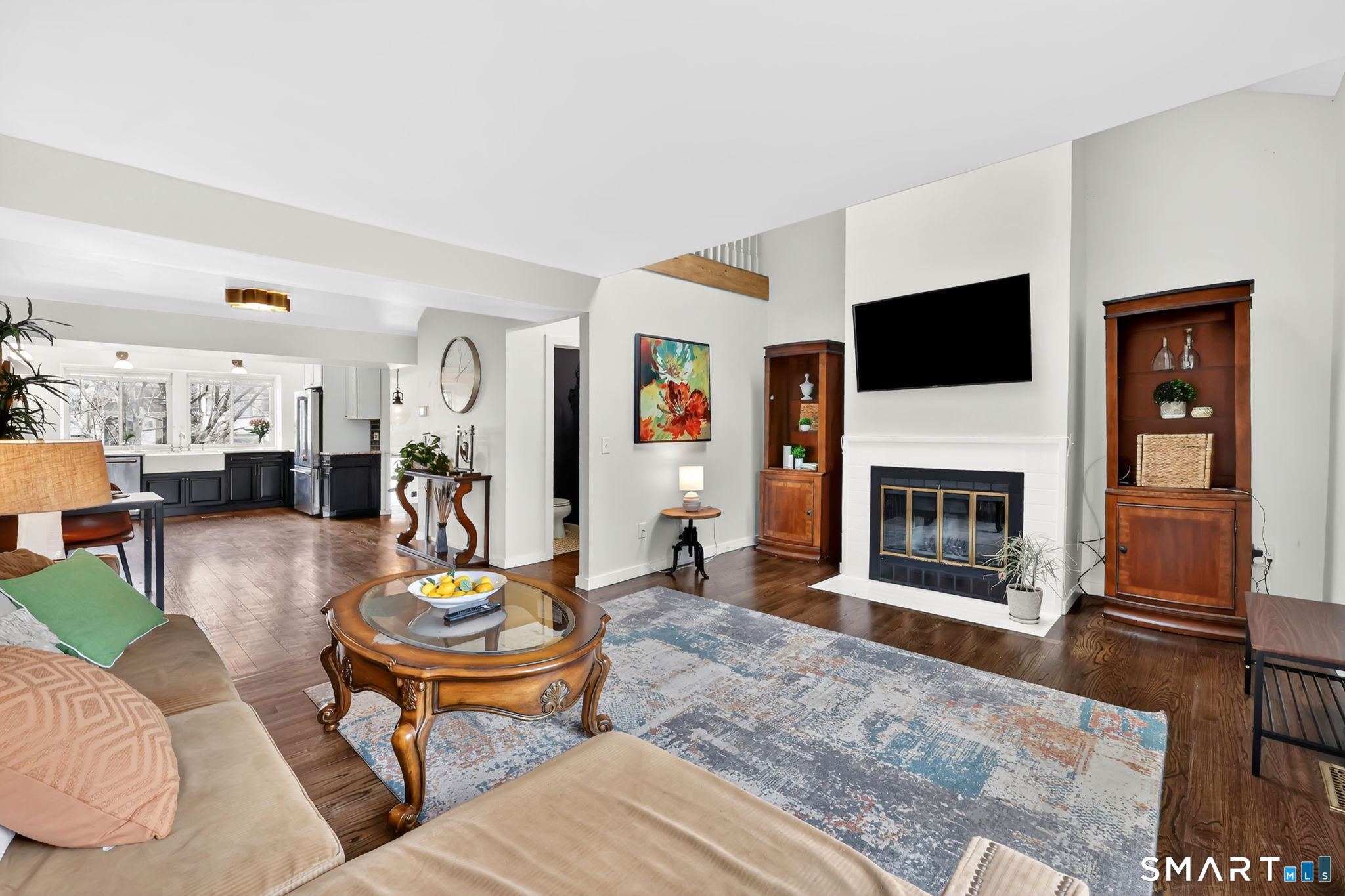8 Whirling Dun, Unit 8 Canton, CT 06019 - Photo 28 of 28 a living room with furniture and a fireplace
