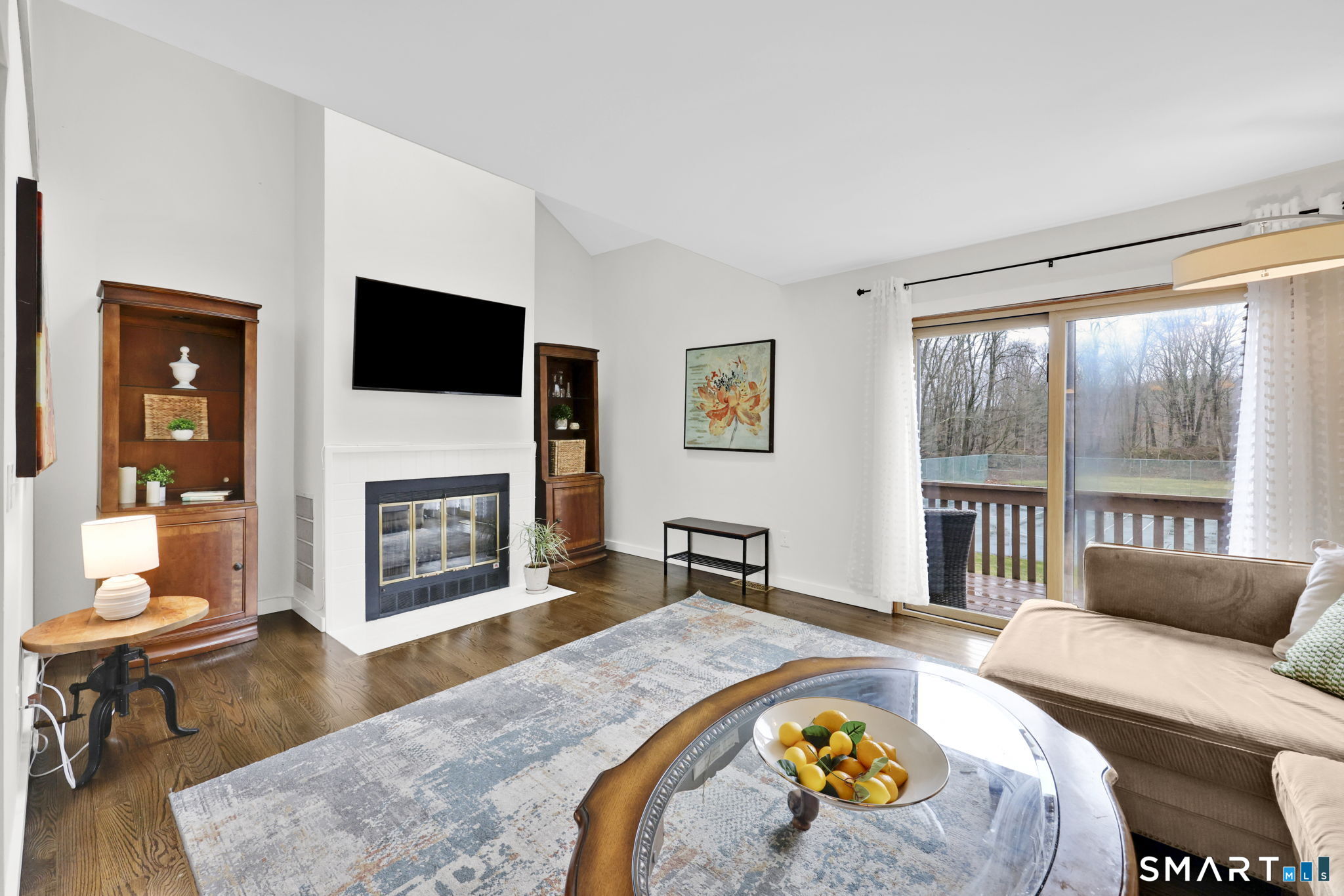 8 Whirling Dun, Unit 8 Canton, CT 06019 - Photo 6 of 28 a living room with furniture fireplace and a flat screen tv