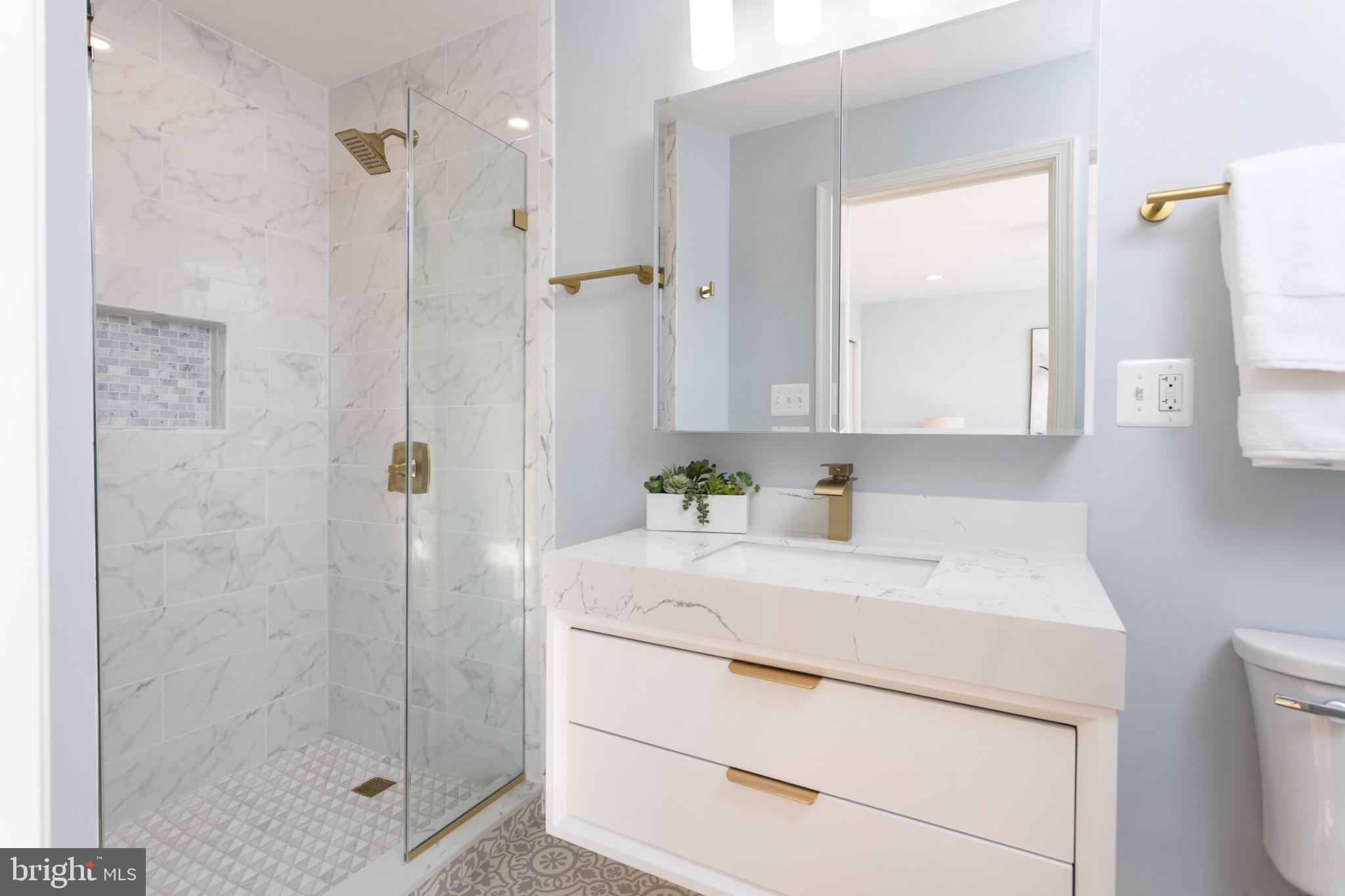 412 Aigburth Road Baltimore, MD 21286 - Photo 14 of 32 Sleek modern bathroom oasis.