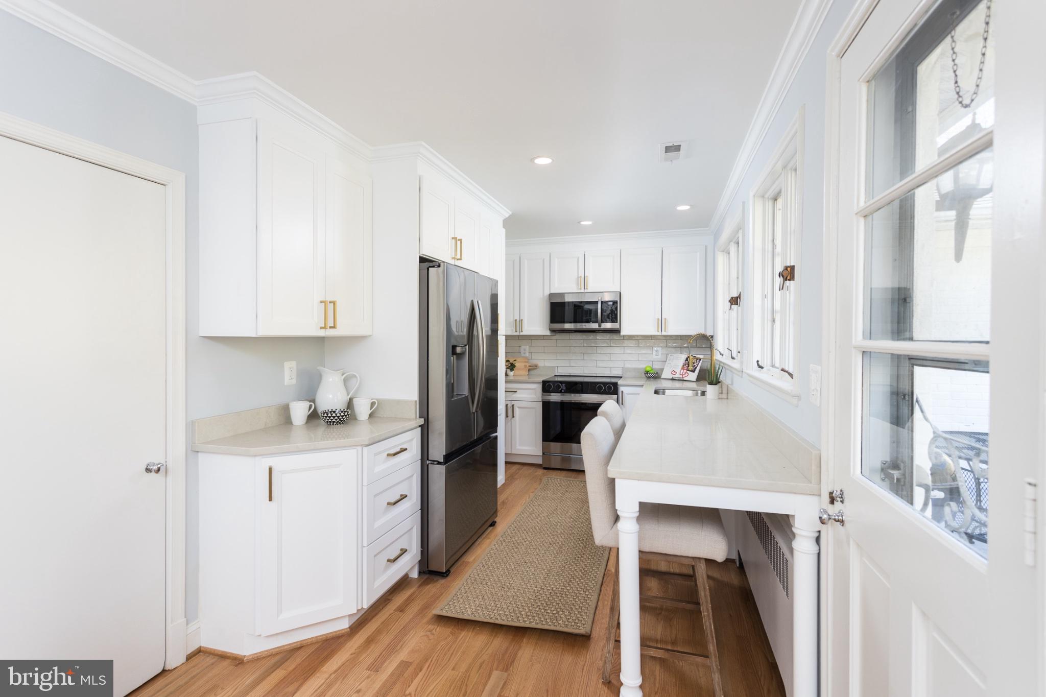 412 Aigburth Road Baltimore, MD 21286 - Photo 5 of 32 Modern kitchen with sleek finishes.